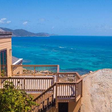 View from upper Bedroom Across Main House onto the Atlantic and Sunrise